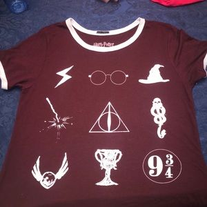 Maroon Harry Potter t-shirt. Symbols from movie.